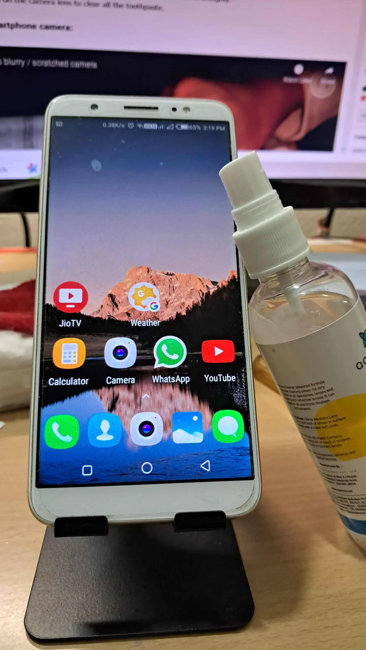 phone with aqua lens clearing liquid
